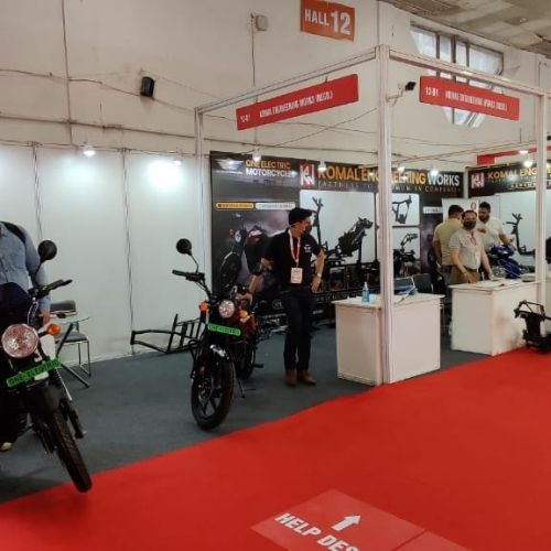 Electric vehicle displays at Komal Engineering Works exhibition stall